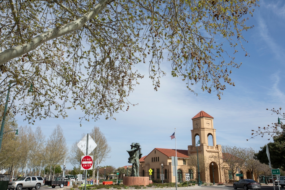 Tracy, California, USA. Afternoon sun shines on the historic downtown Train Station.